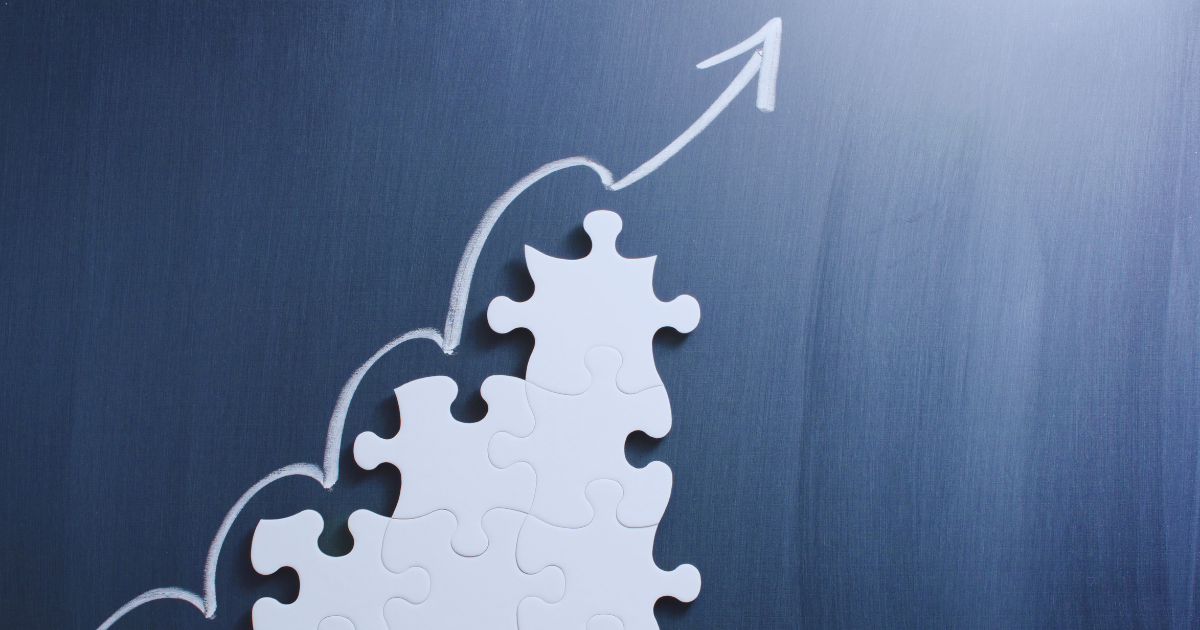 Audit 2024 post graphic Photo of incomplete puzzle with upward arrow